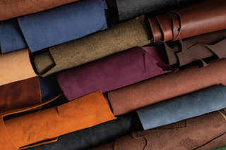 Various types of leather rolls showcasing textures and rich colors