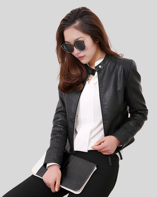 City Sleek Women's Fitted Black Leather Jacket with Textured Sleeves 3