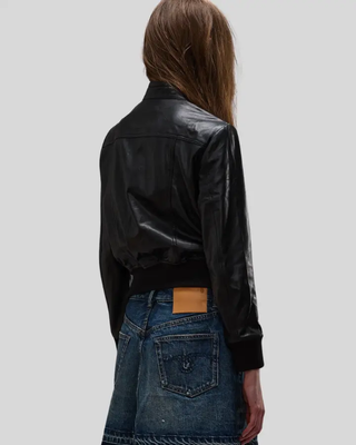 Back view of Emma black leather bomber jacket with ribbed cuffs