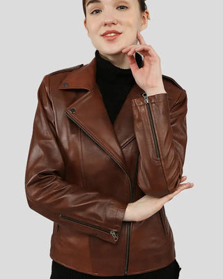 Model posing in Filippa brown biker leather jacket
