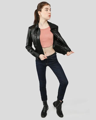 Woman wearing black leather jacket and jeans