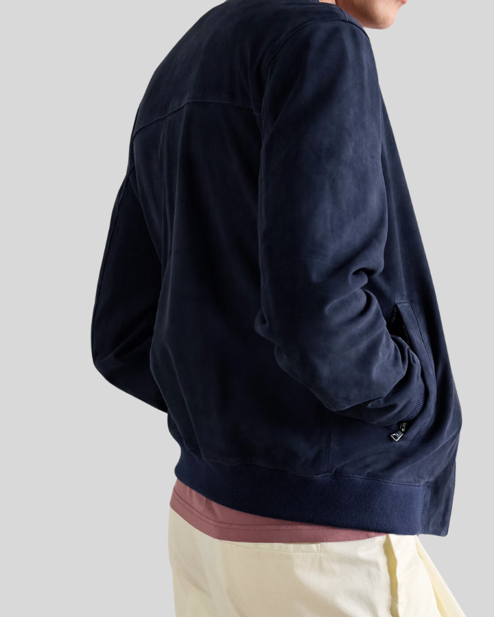 Back view of Baris dark blue suede bomber jacket