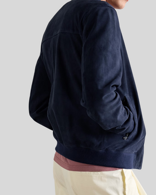 Back view of Baris dark blue suede bomber jacket