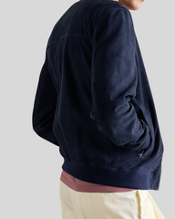 Back view of Baris dark blue suede bomber jacket
