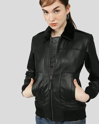 Gemma black bomber leather jacket with fur, hands in pockets