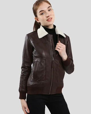 Model wearing Thalia brown leather jacket with fur collar