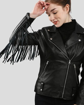 Detail of fringe on black biker leather jacket sleeve